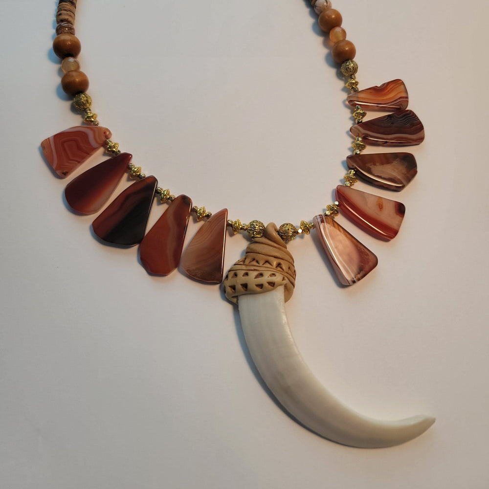 
                  
                    "Babaylan" Boar's Tusk Pendant with Red Agate and Wood Elements Necklace Herbalaria 
                  
                