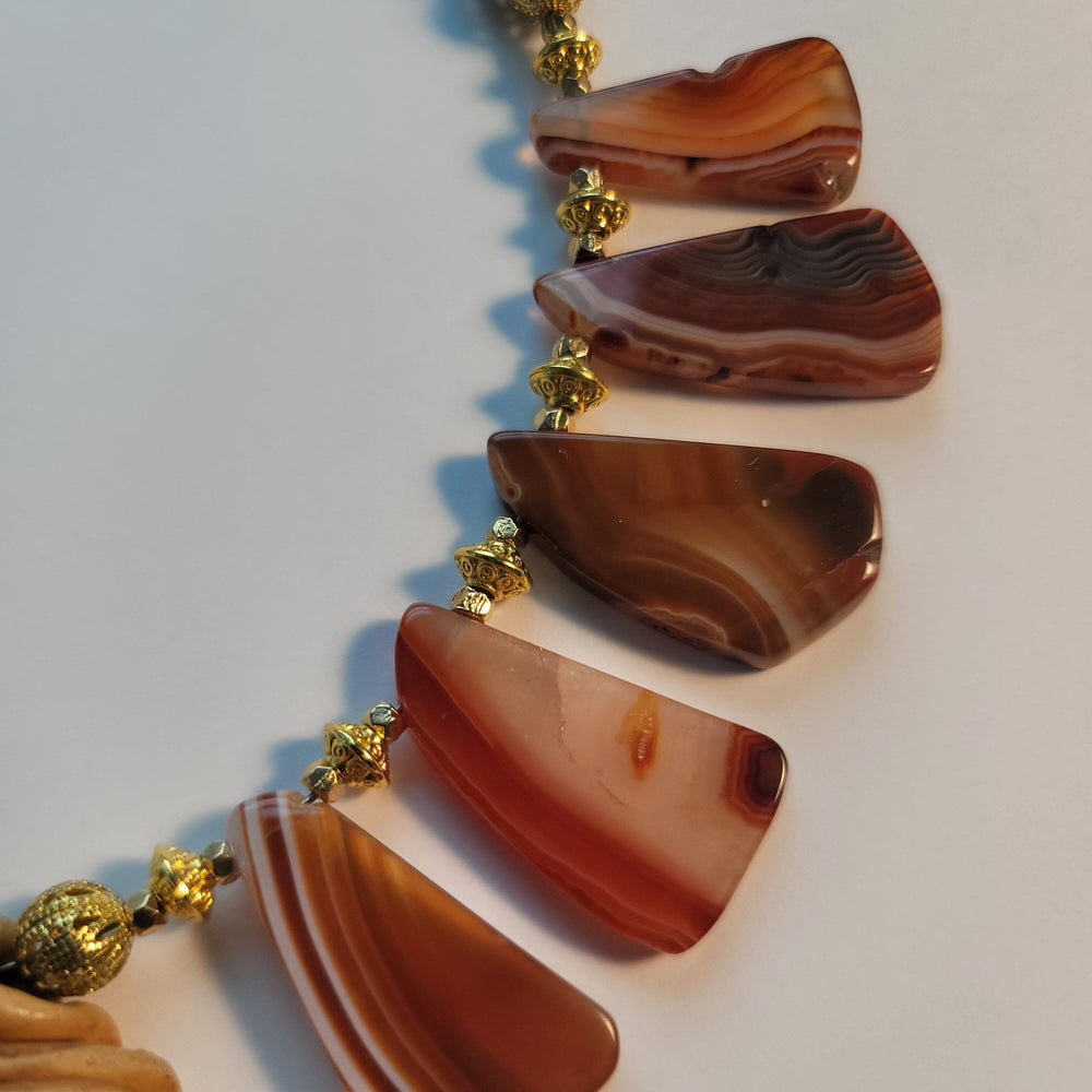 
                  
                    "Babaylan" Boar's Tusk Pendant with Red Agate and Wood Elements Necklace Herbalaria 
                  
                