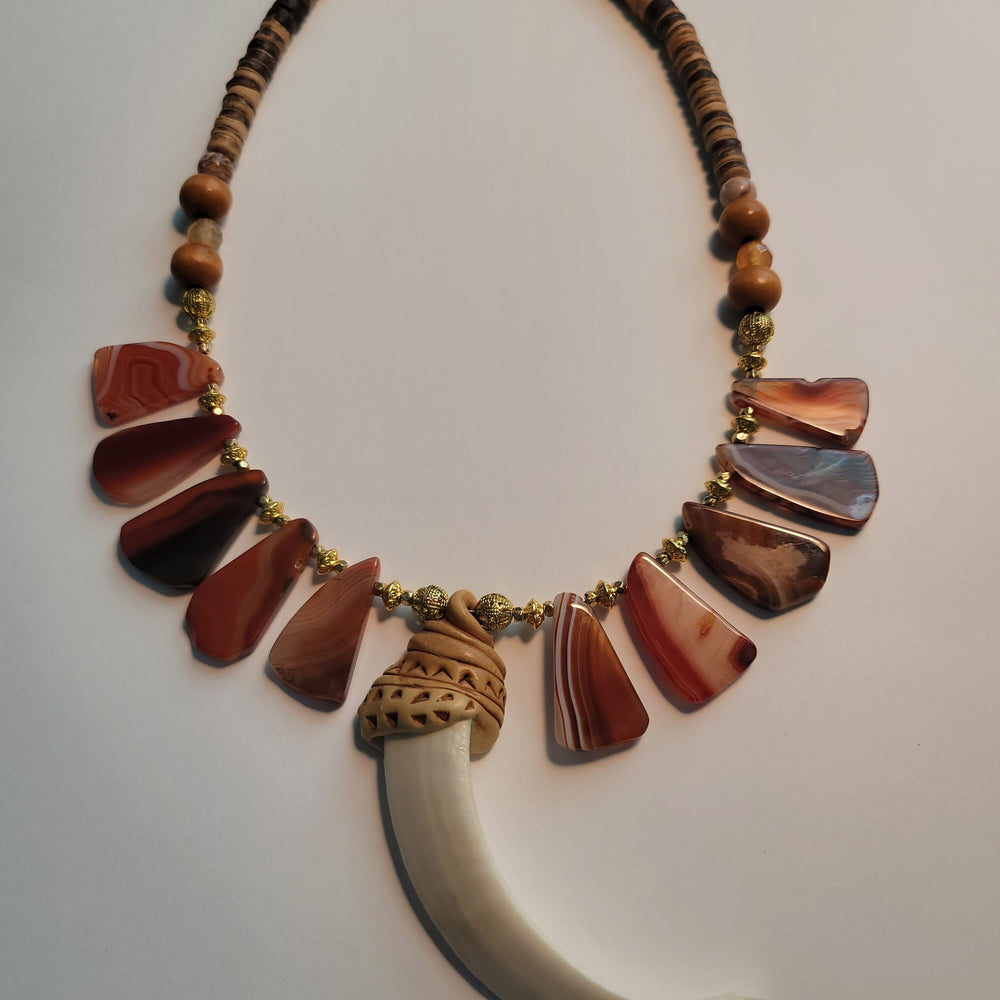 
                  
                    "Babaylan" Boar's Tusk Pendant with Red Agate and Wood Elements Necklace Herbalaria 
                  
                