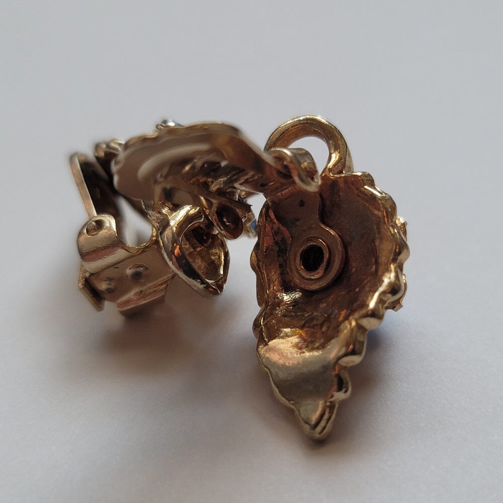 
                  
                    Blue Gem Flower and Gold Leaf Accessories Herbalaria LLC 
                  
                
