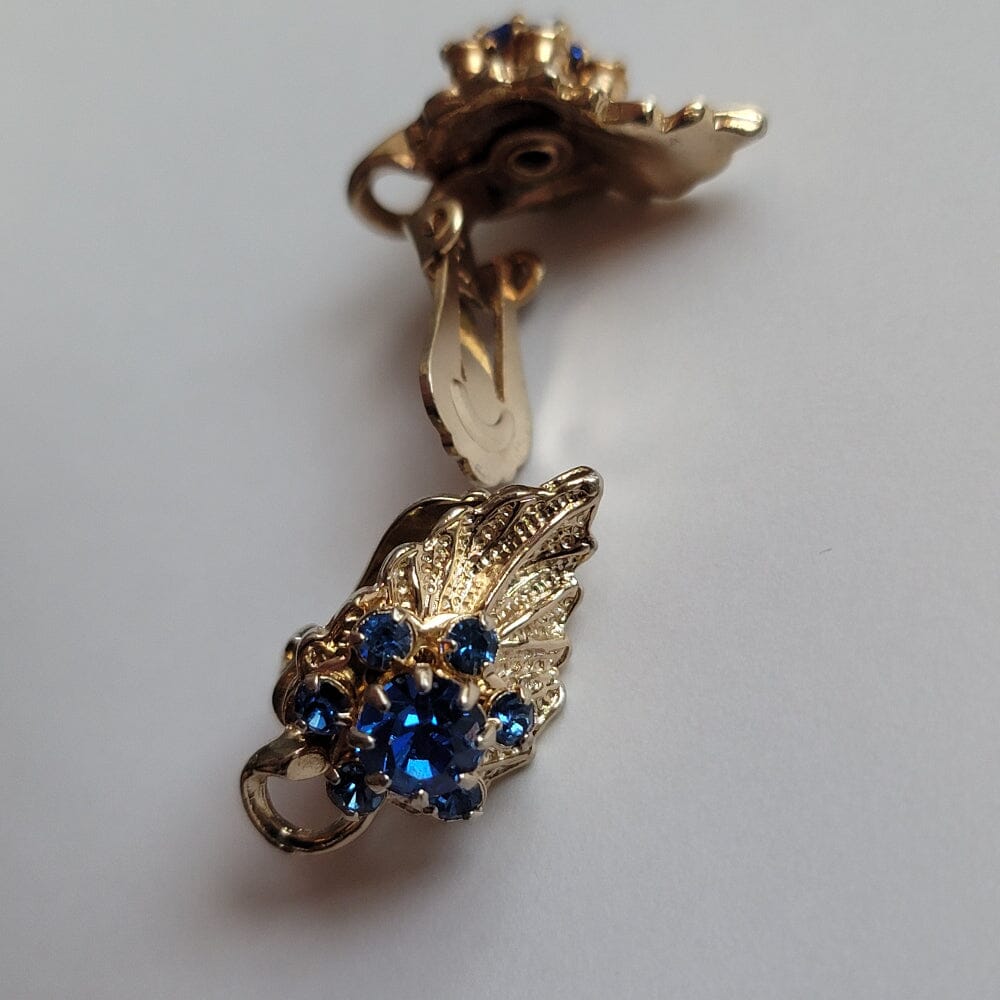 
                  
                    Blue Gem Flower and Gold Leaf Accessories Herbalaria LLC 
                  
                