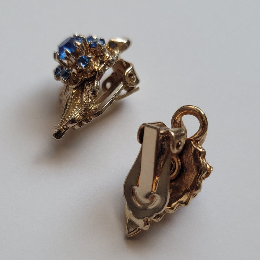
                  
                    Blue Gem Flower and Gold Leaf Accessories Herbalaria LLC 
                  
                