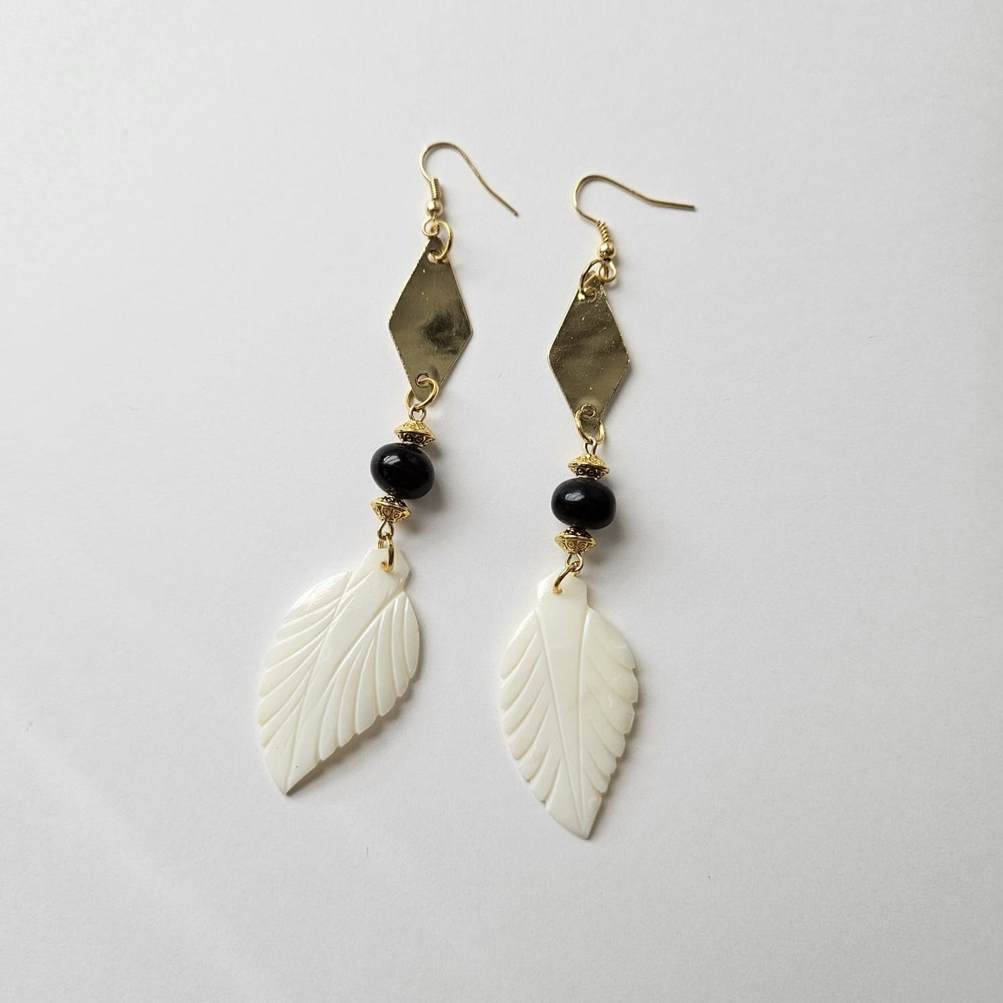 "Healer" Herbalaria  Brass and carabao horn earring with mother-of-pearl drop 