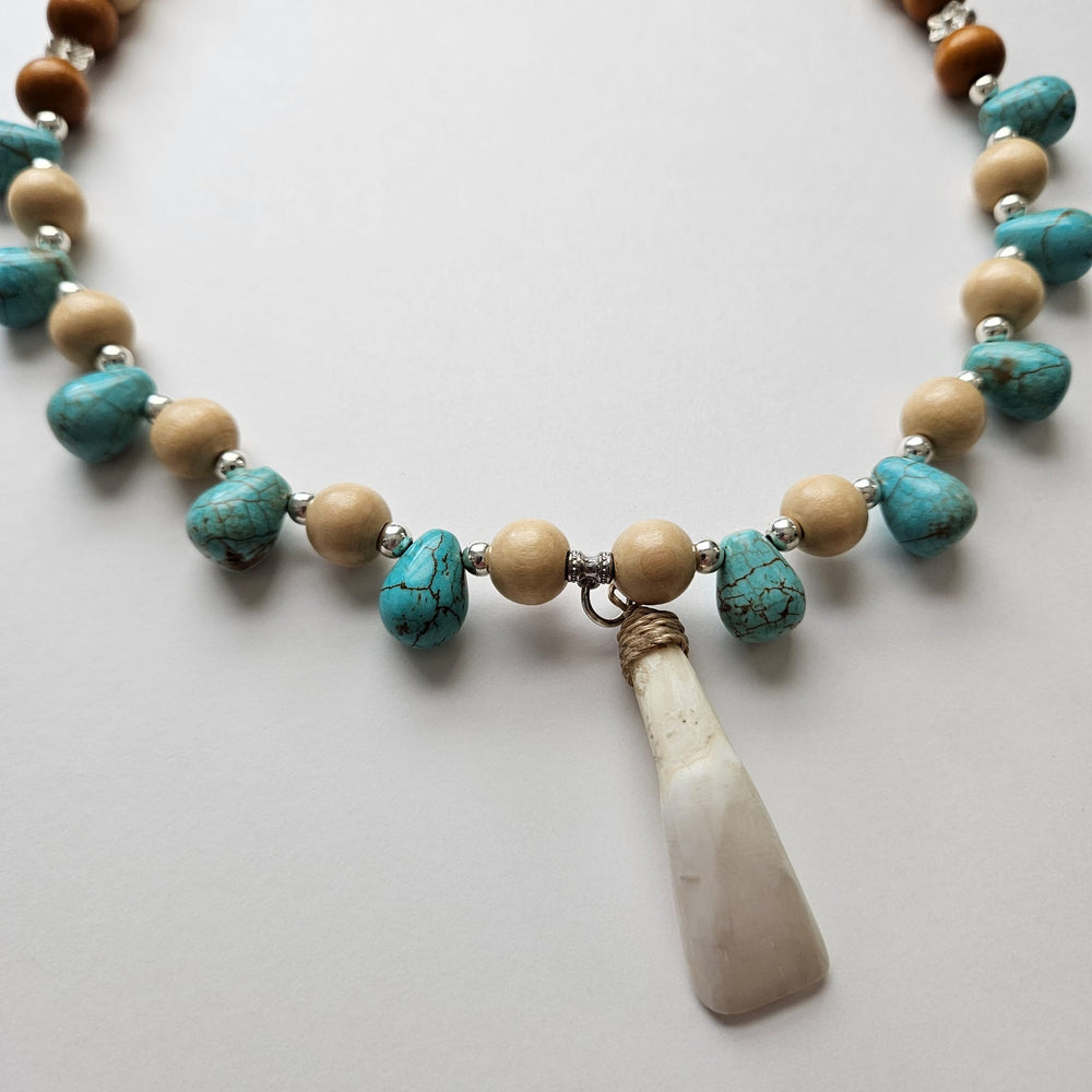 
                  
                    "Lupa at Tubig" Earth and Water Carabao Tooth Pendant and Turquoise Howlite Necklace Accessories Herbalaria 
                  
                